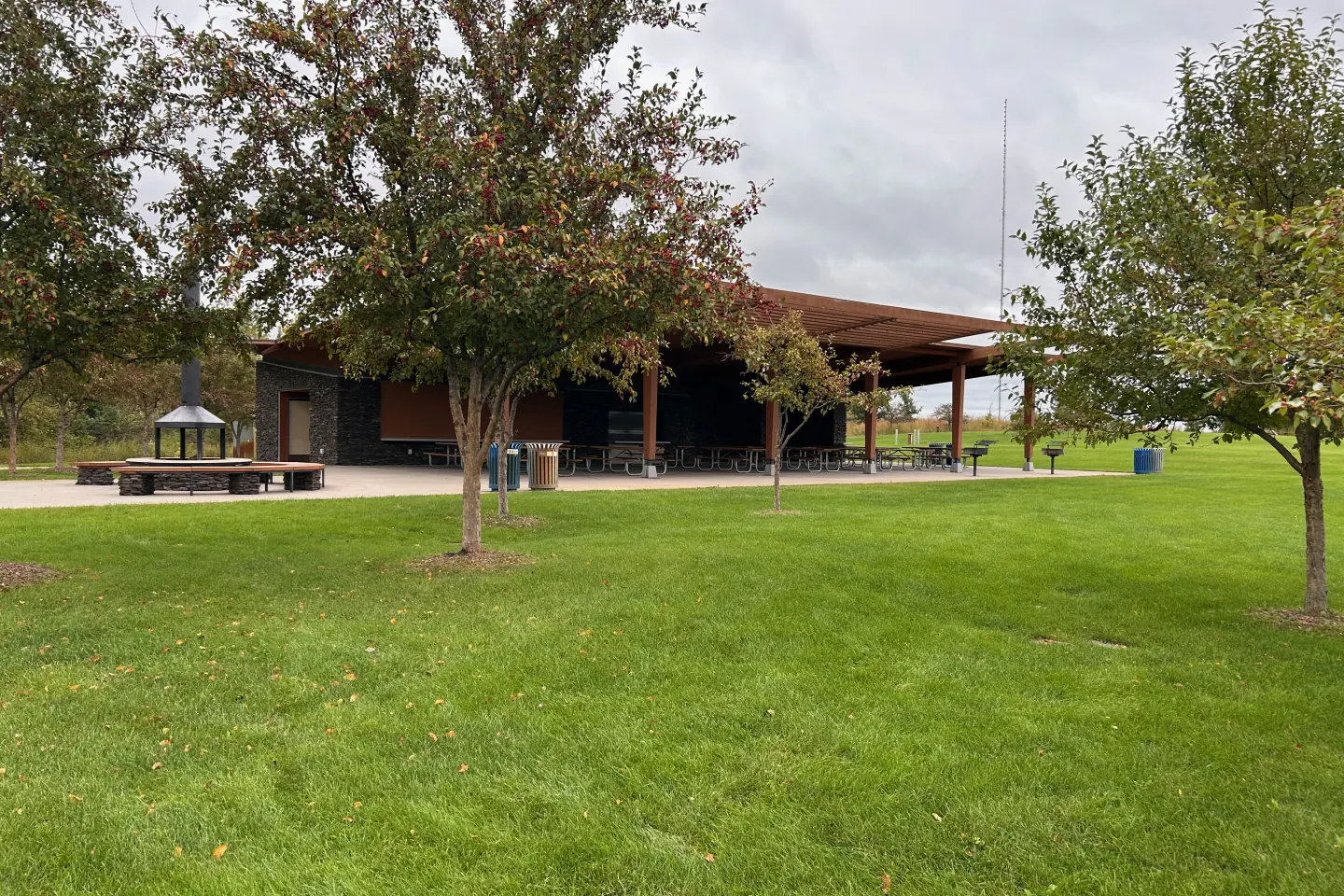 The open-sided Empire Lake Shelter viewed across the lawn